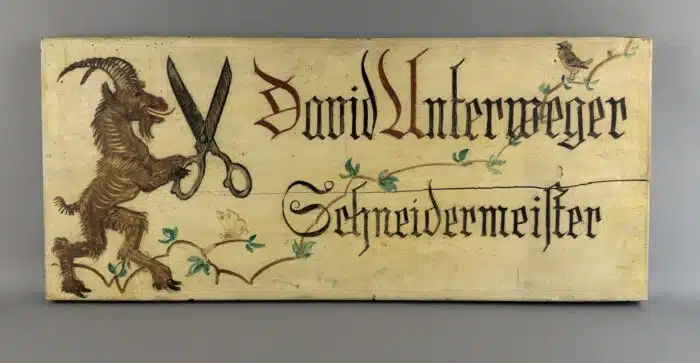 Switbert Lobisser - Aus persönlichem Besitz - Von Lobisser angefertigtes, gestaltetes und bemaltes Firmenschild David Unterweger Schneidermeister